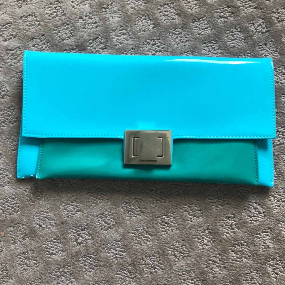 Aldo Turquoise and green clutch